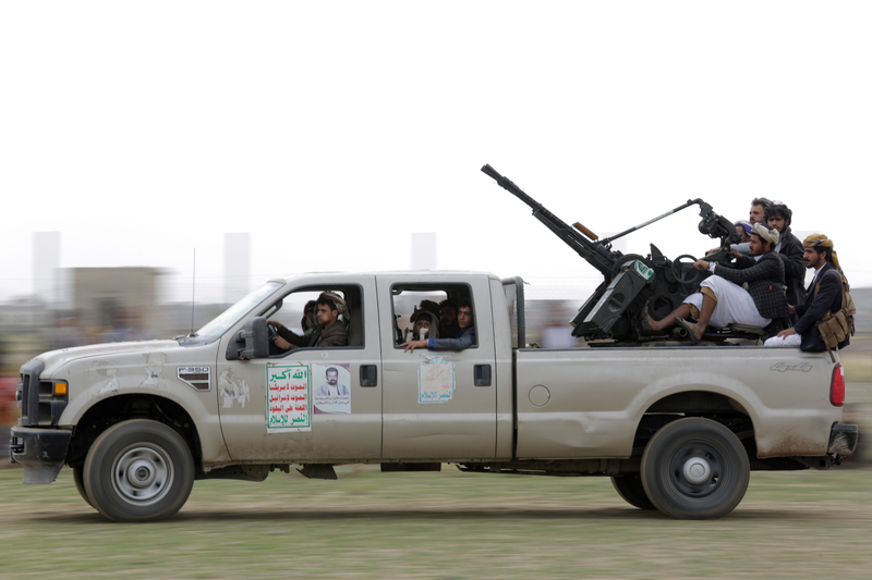 Houthi rebel fighters in a Ford F-350 with ZU-2 twin 14.5-millimeter heavy machine guns.